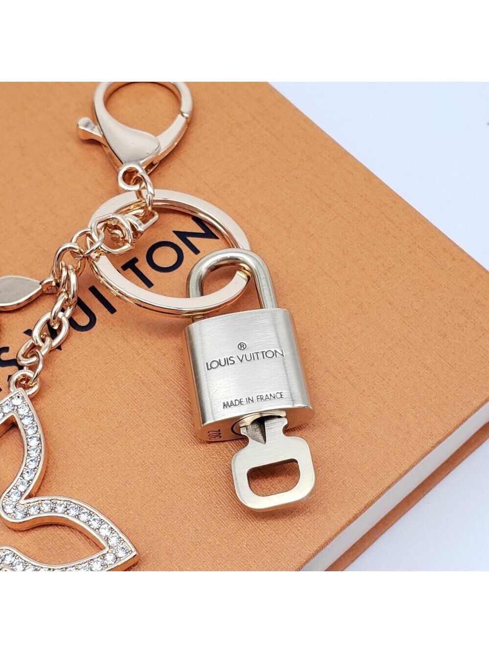 Authentic Louis Vuitton Gold Lock & Box w/ Unbranded Clover Bagcharm - Picture 7 of 9